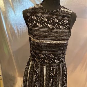 Cute black and white sleeveless fitted/flare dress